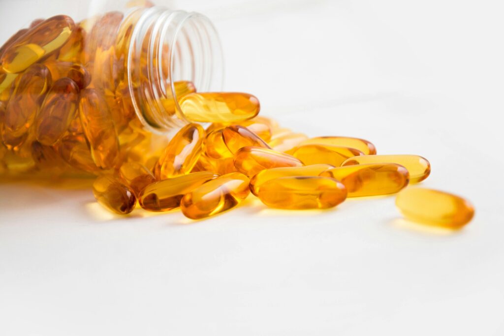 capsules coming out of a bottle