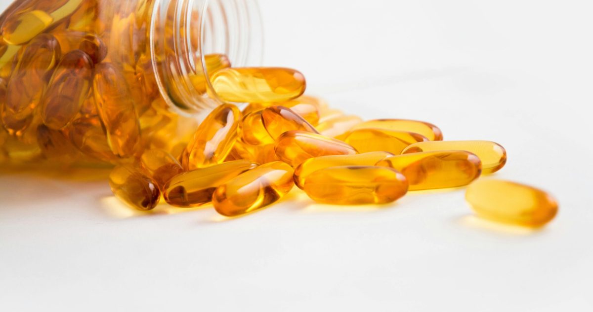 capsules coming out of a bottle